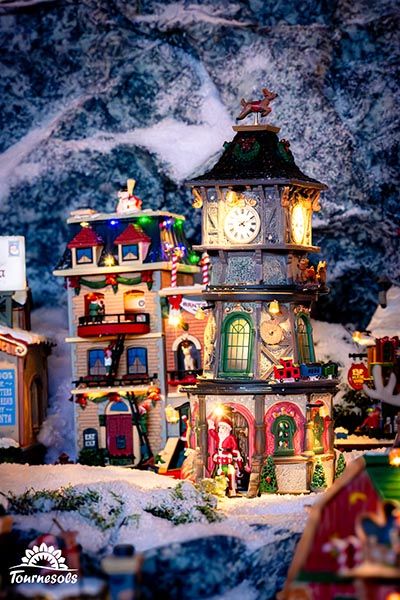 Les dernières nouveautés Lemax 2024 pour les villages de Noël, présentant des maisons miniatures décorées et illuminées.